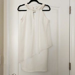 Trapeze, beaded neckline dress